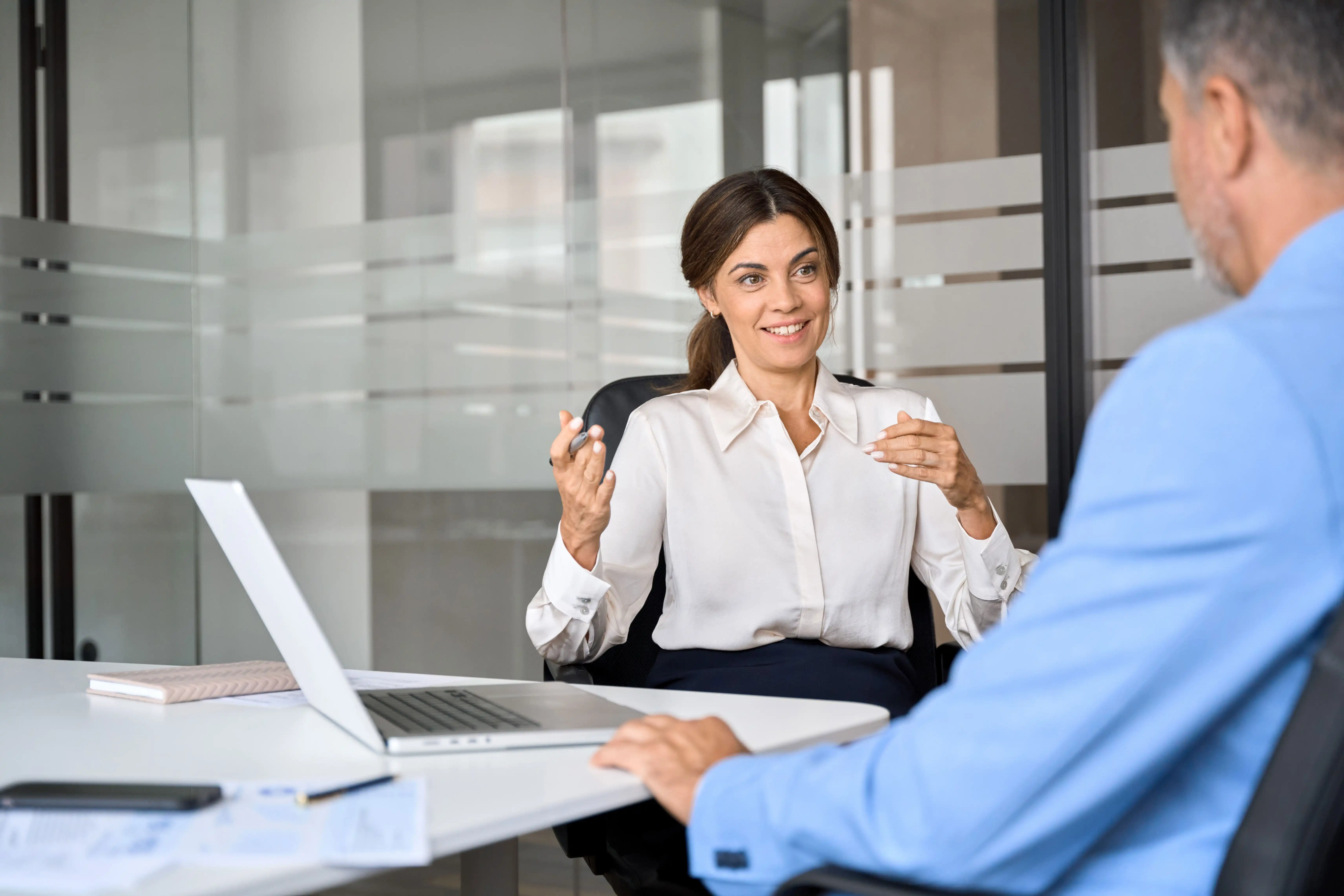 smart, professional woman discussing credit risk