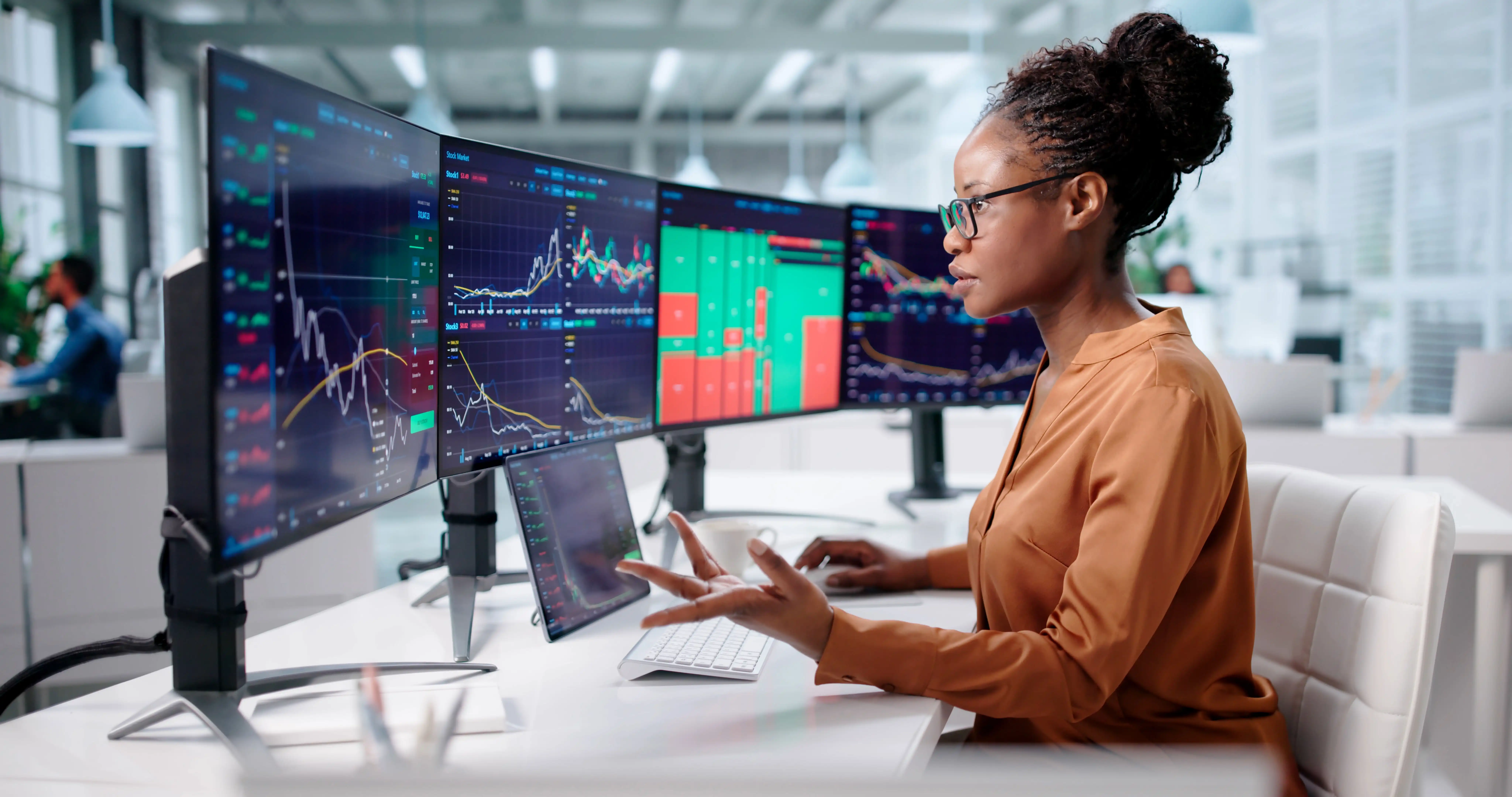woman at desk analysing credit risk data